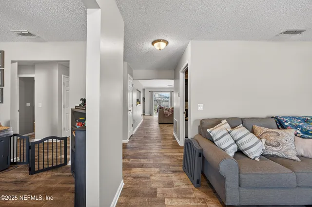 a living room with furniture and a couch