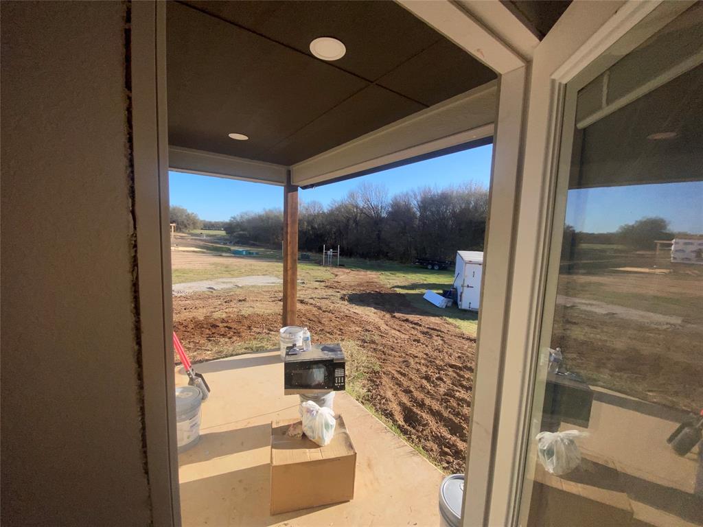 1032 Rays Way Weatherford, TX 76085 - Photo 5 of 25 a view of a porch
