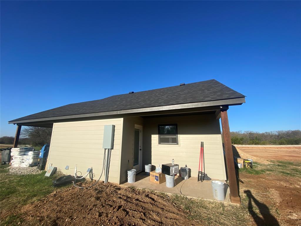 1032 Rays Way Weatherford, TX 76085 - Photo 7 of 25 a view of a backyard