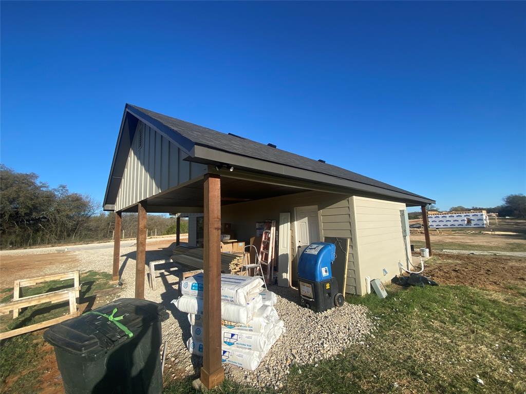1032 Rays Way Weatherford, TX 76085 - Photo 8 of 25 a view of a car park in front of house