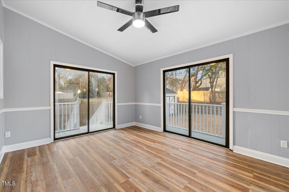 2025 Port Royal Road Raleigh, NC 27609 - Photo 46 of 67 a view of empty room with wooden floor and fan