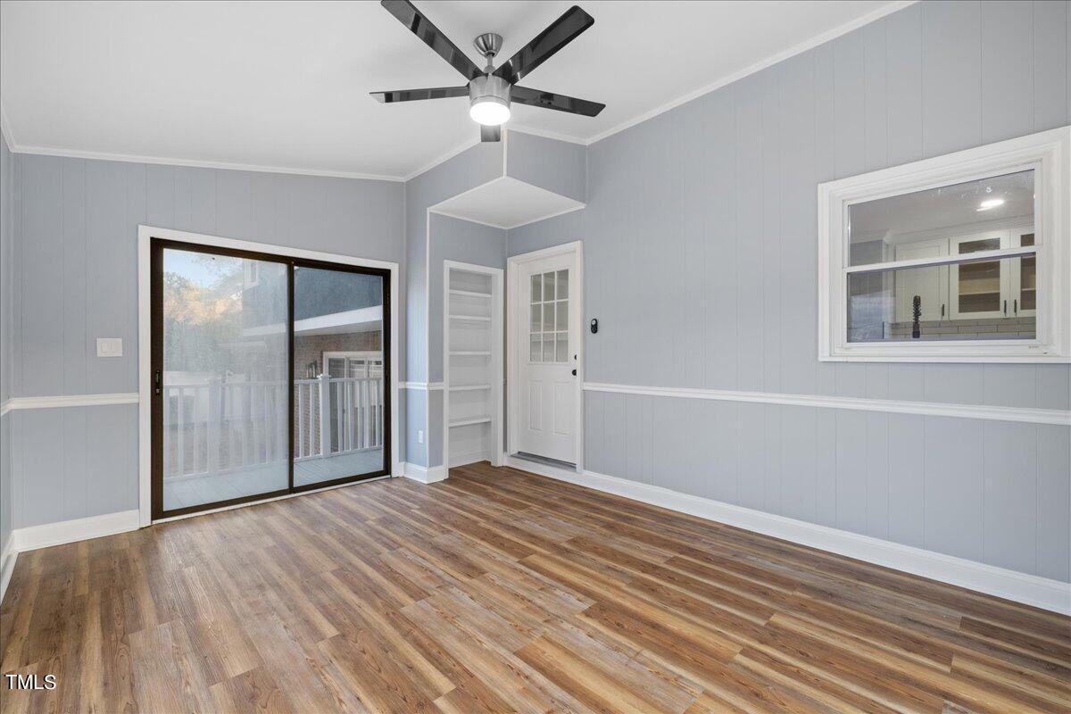 2025 Port Royal Road Raleigh, NC 27609 - Photo 47 of 67 a view of empty room with wooden floor and fan