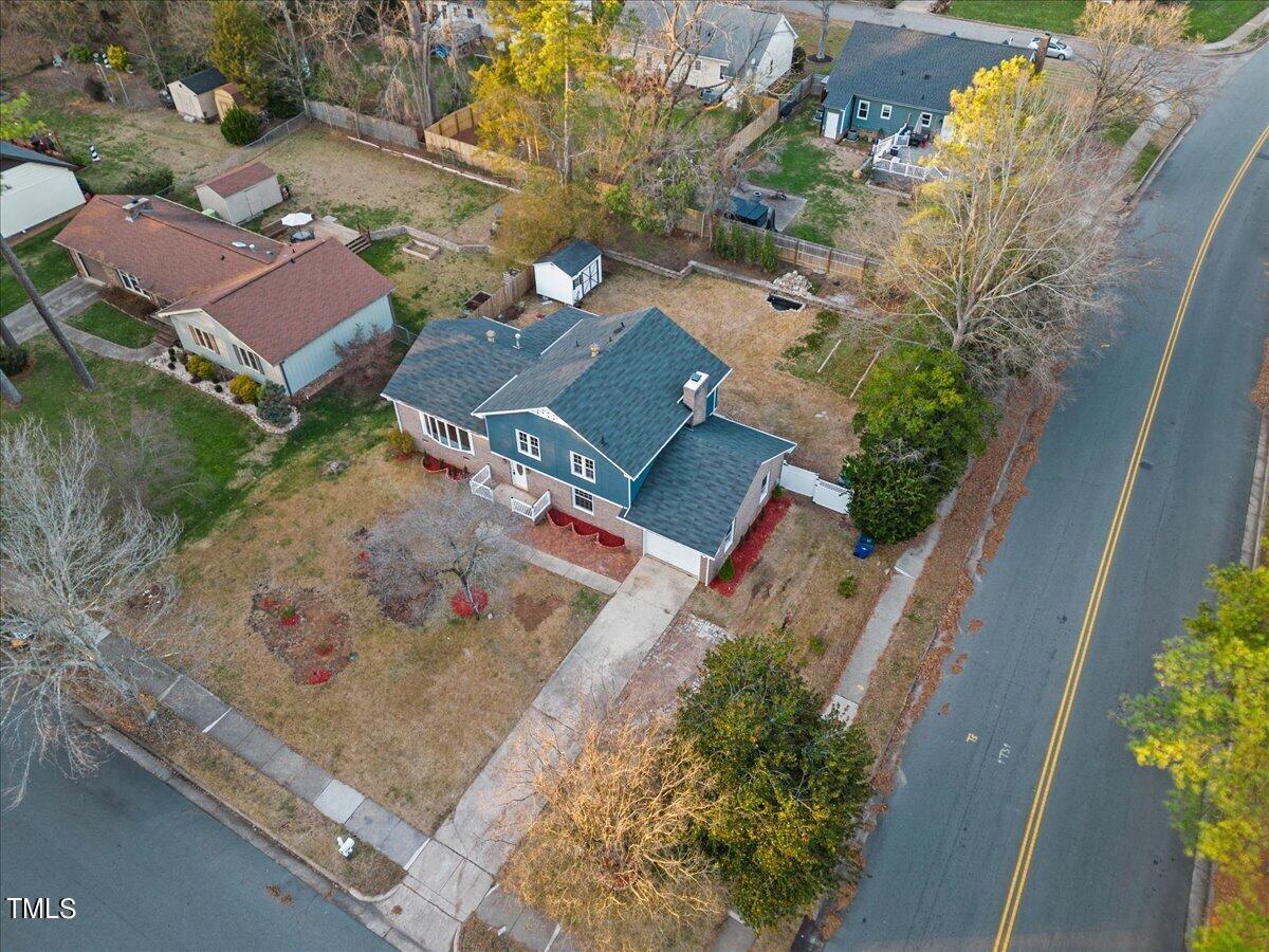 2025 Port Royal Road Raleigh, NC 27609 - Photo 63 of 67 an aerial view of a house with a yard