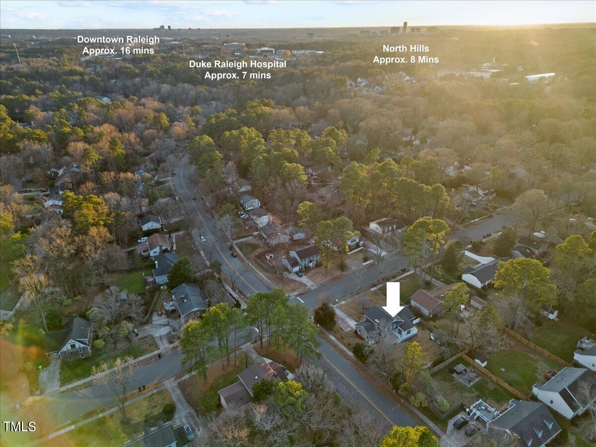 2025 Port Royal Road Raleigh, NC 27609 - Photo 66 of 67 an aerial view of residential building with parking space