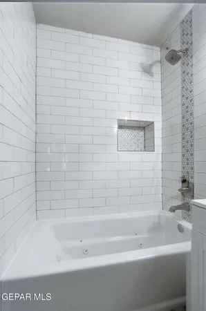 a bathroom with a bathtub