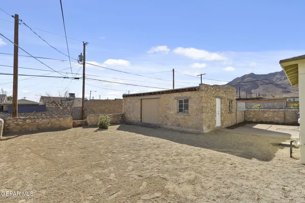 a view of a back yard of the house
