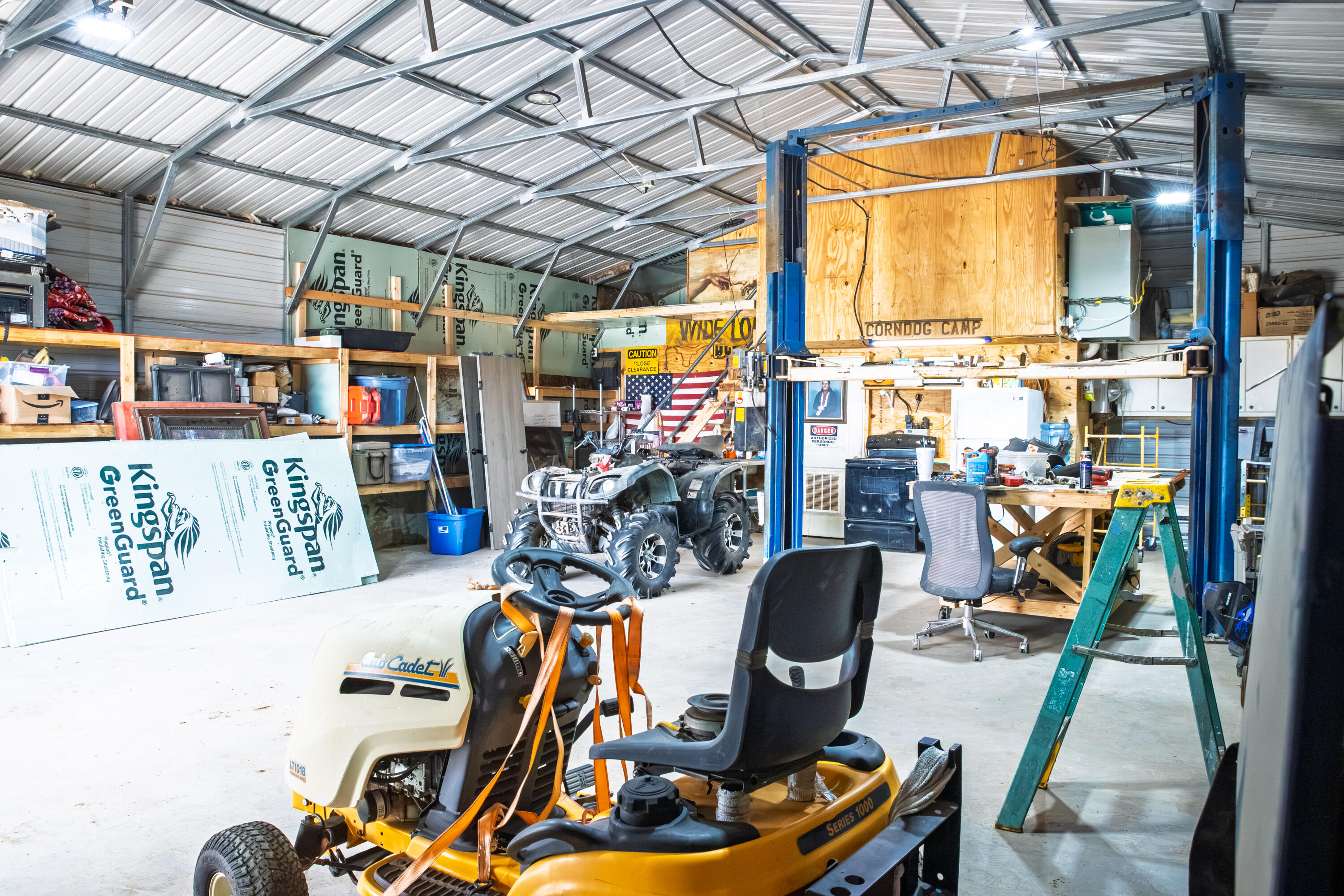 8233 County Road 6440 Lubbock, TX 79416 - Photo 22 of 25 lift in garage