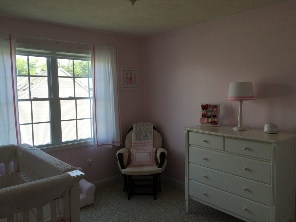 22 Whispering Pine Circle, Unit 29 Worcester, MA 01606 - Photo 12 of 30 a living room with furniture and a window