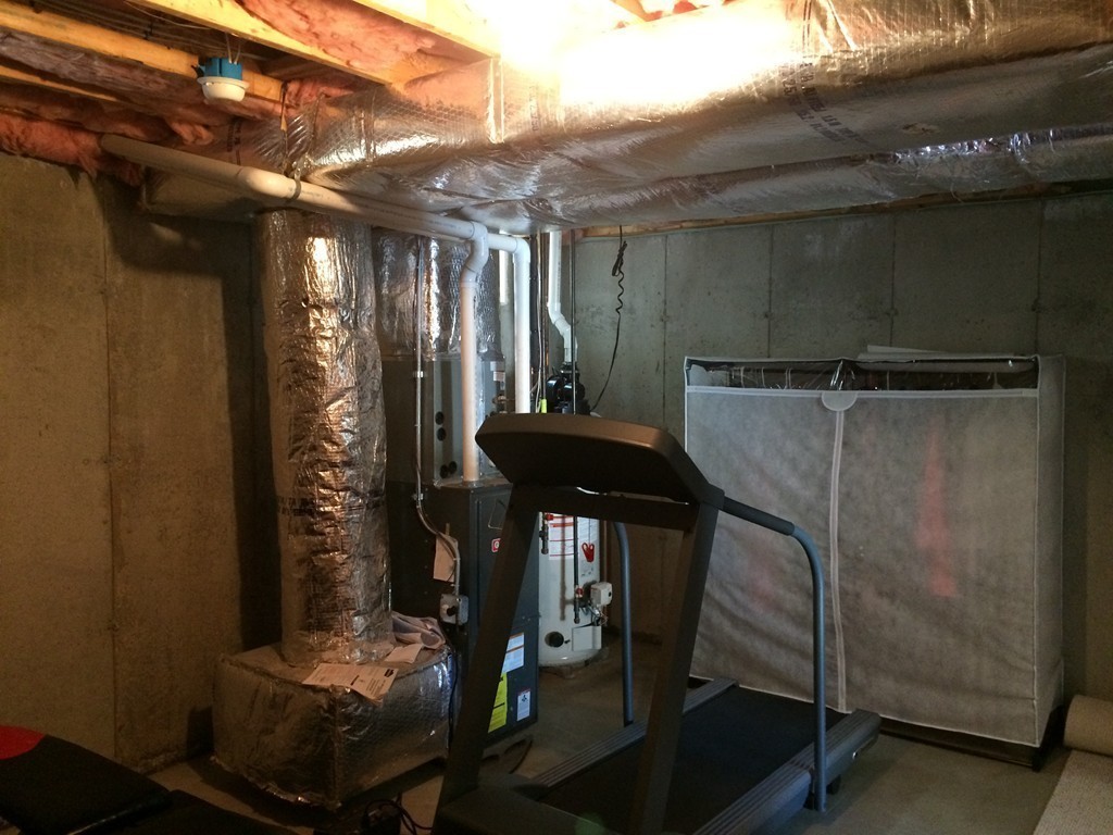 22 Whispering Pine Circle, Unit 29 Worcester, MA 01606 - Photo 25 of 30 a view of entryway with a chair and tables