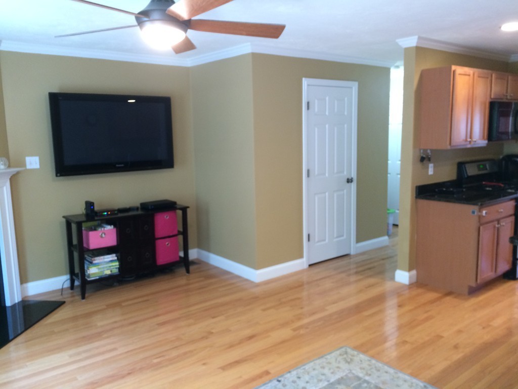 22 Whispering Pine Circle, Unit 29 Worcester, MA 01606 - Photo 5 of 30 a living room with furniture and a flat screen tv