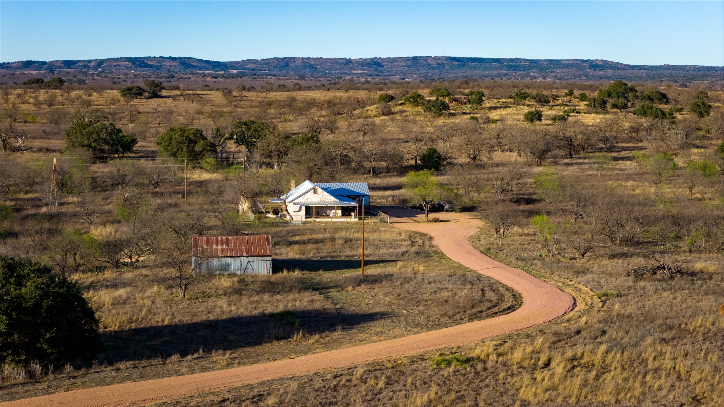 126 Buffalo Rd Valley Spring Valley Spring, TX 76885 - Photo 30 of 39 View of rural area featuring a mountainous background