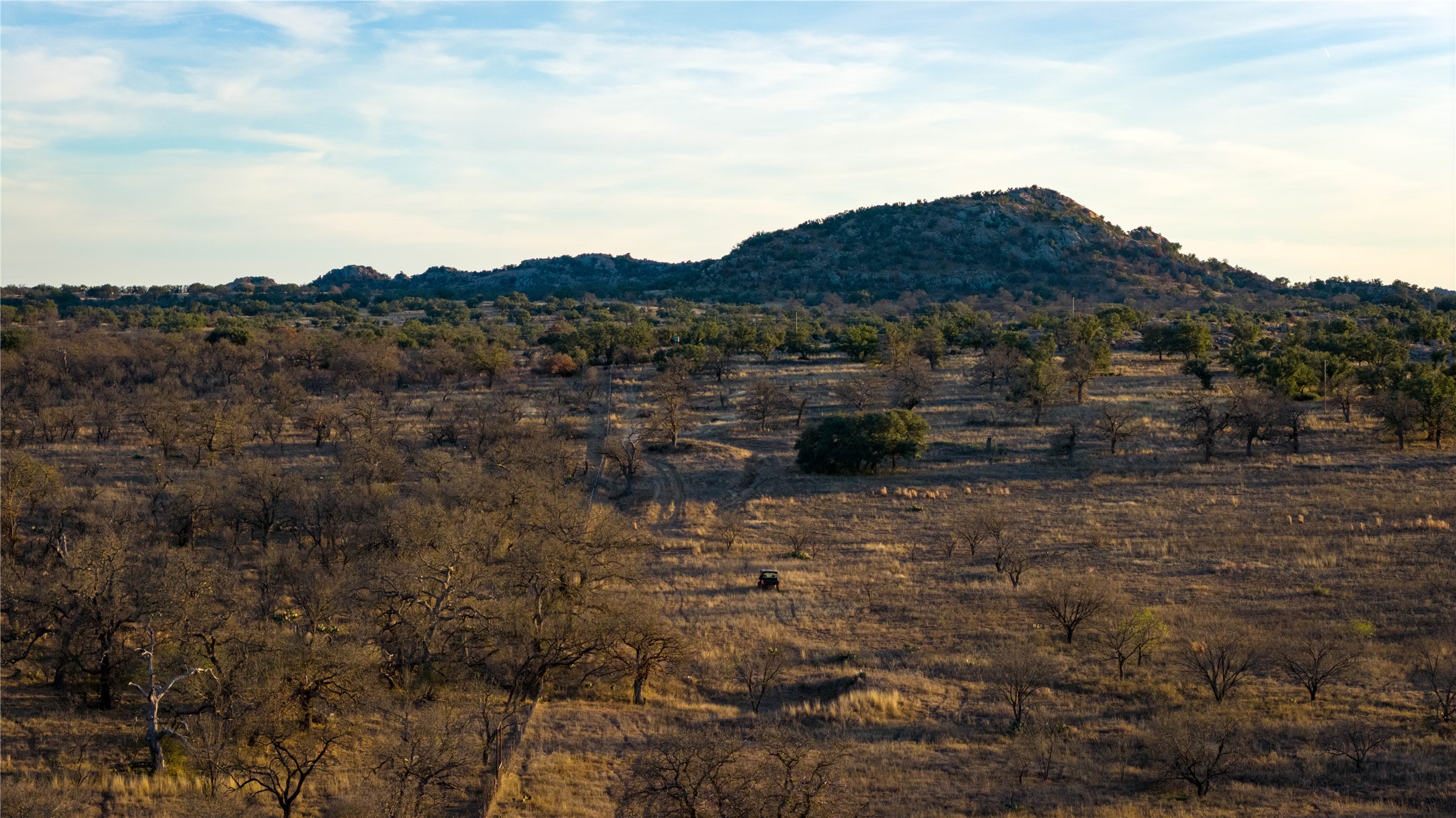 126 Buffalo Rd Valley Spring Valley Spring, TX 76885 - Photo 34 of 39 View of mountain background with rural landscape