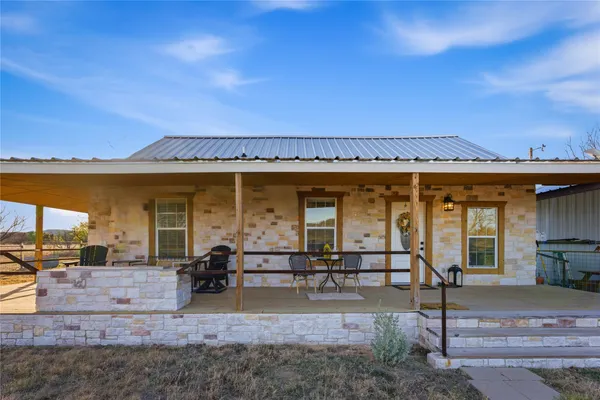 a view of a house with patio