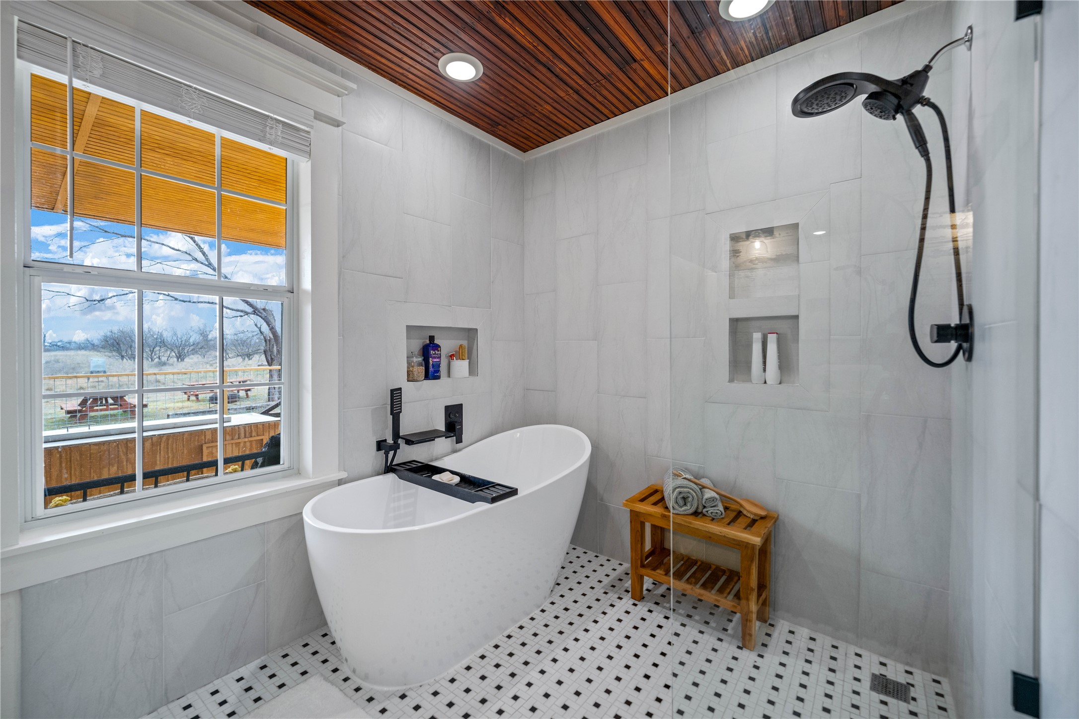 126 Buffalo Rd Valley Spring Valley Spring, TX 76885 - Photo 9 of 39 Full bath with tile walls, a freestanding tub, wood ceiling, a tile shower, and recessed lighting