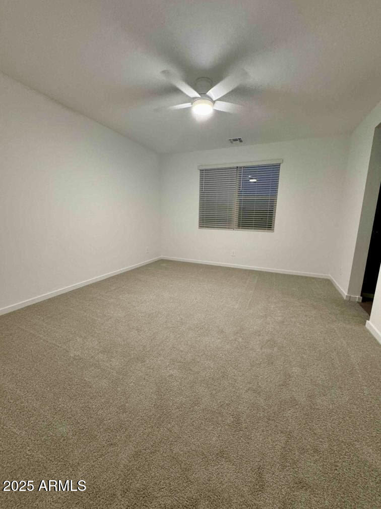 15825 West Gray Fox Trail Surprise, AZ 85387 - Photo 14 of 38 a view of an empty room