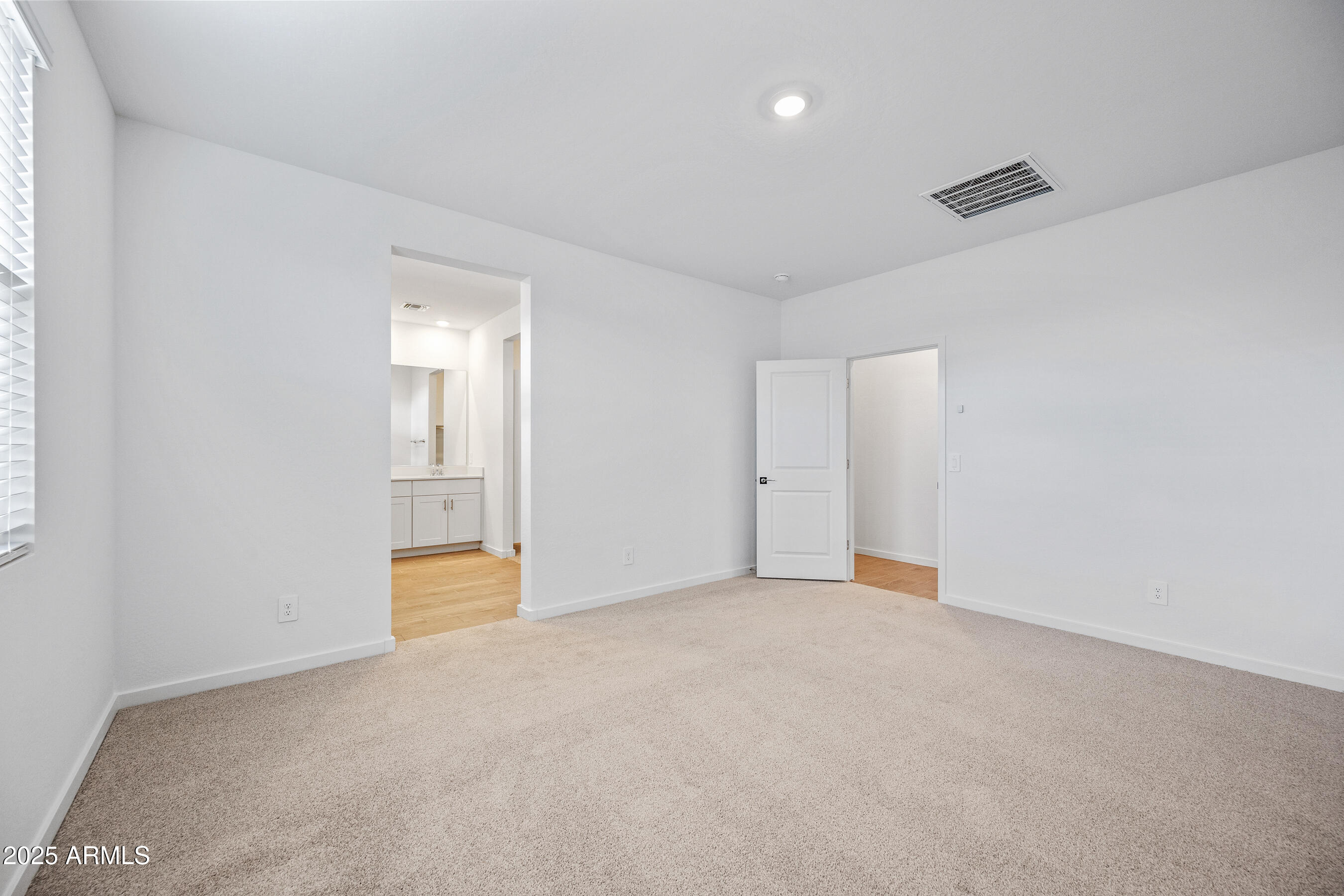 15825 West Gray Fox Trail Surprise, AZ 85387 - Photo 15 of 38 a view of an empty room with a window