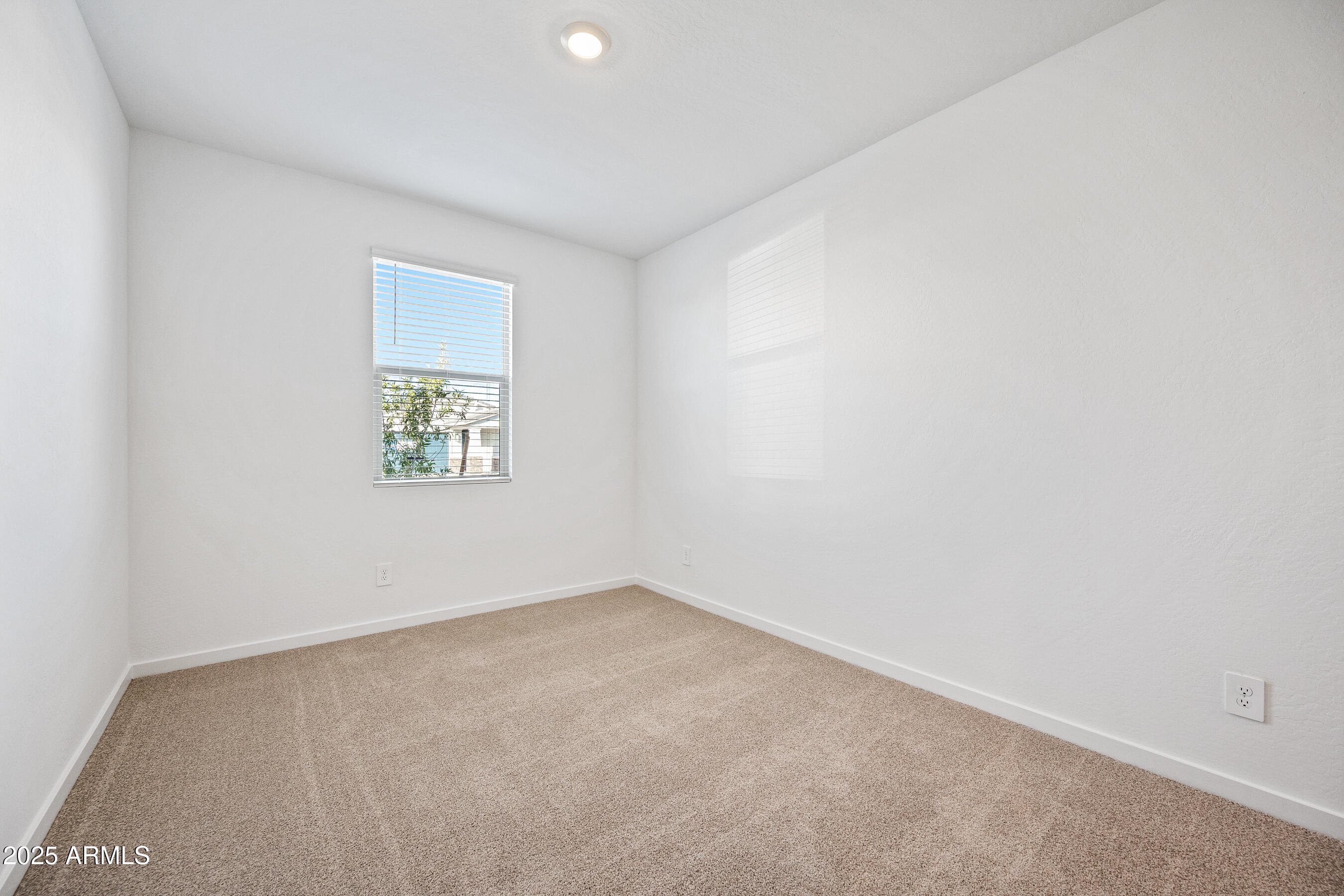 15825 West Gray Fox Trail Surprise, AZ 85387 - Photo 19 of 38 an empty room with a window