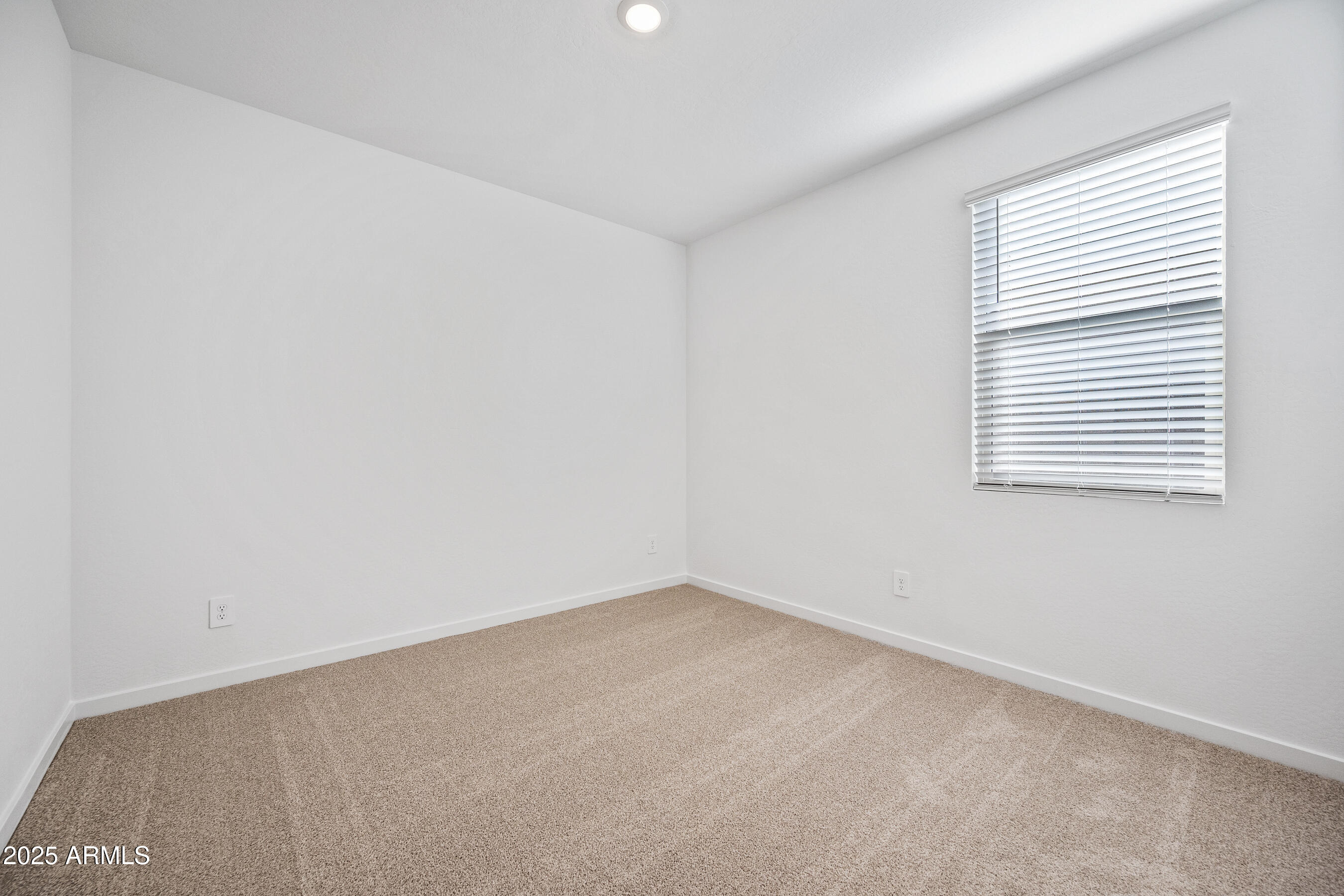 15825 West Gray Fox Trail Surprise, AZ 85387 - Photo 23 of 38 an empty room with a window