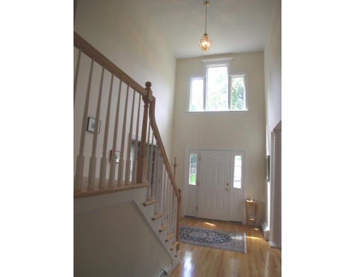 30 Edwardel Road Needham, MA 02492 - Photo 7 of 14 a view of entryway and hall with wooden floor