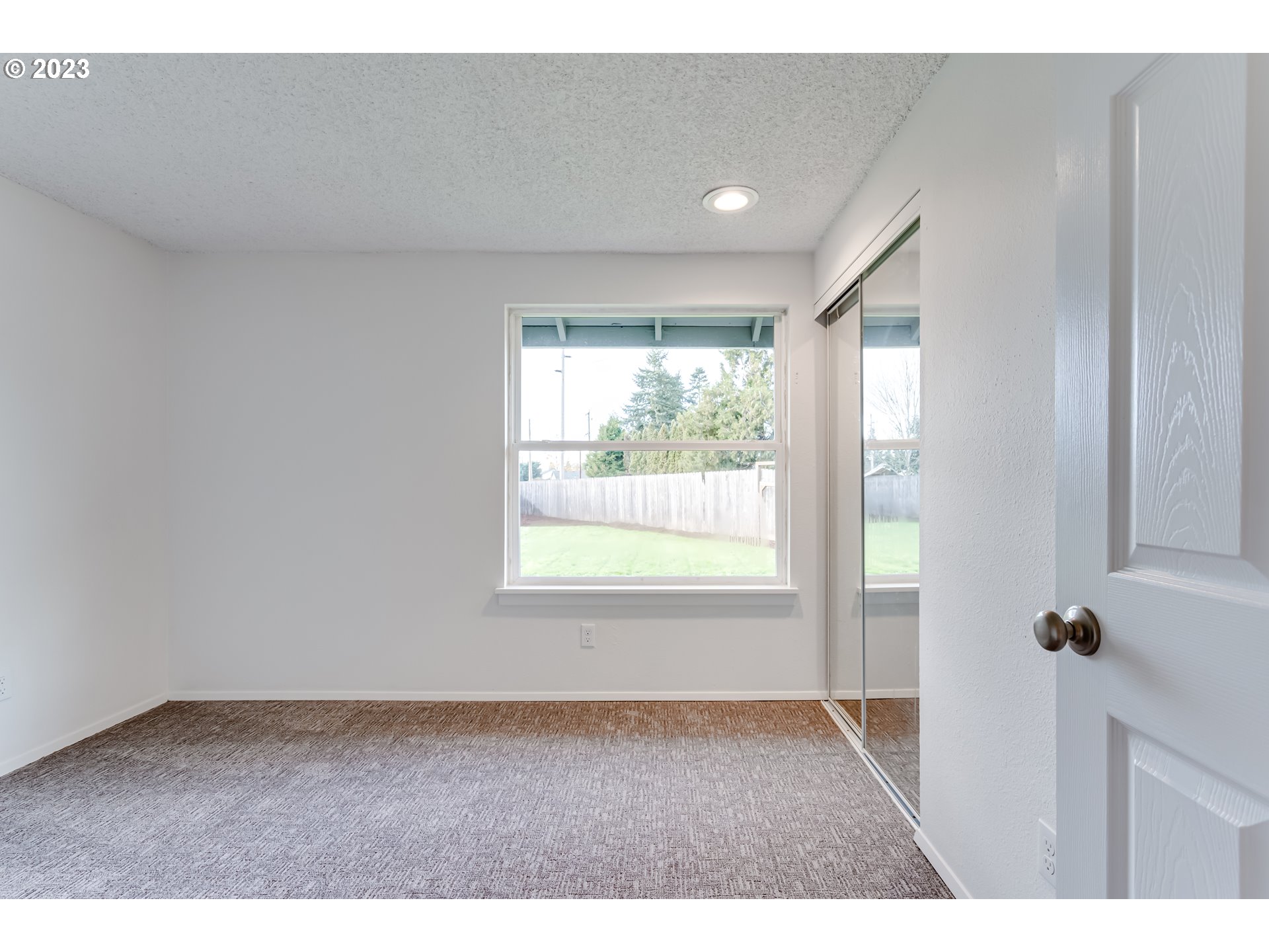 298 S Street Springfield, OR 97477 - Photo 17 of 33 a view of an empty room with a window
