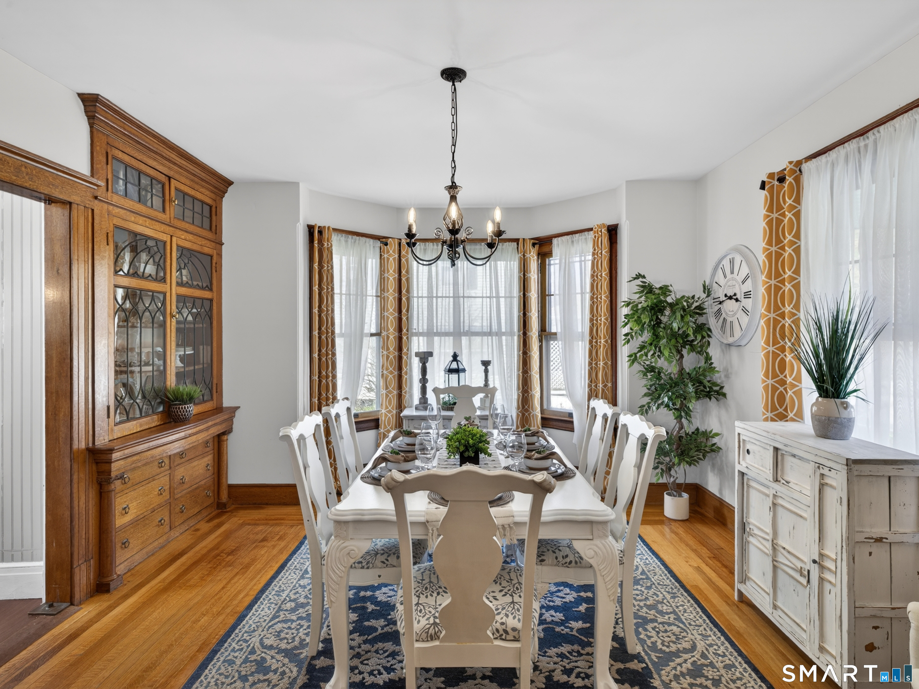 115 West Thames Street Norwich, CT 06360 - Photo 12 of 40 a view of a dining room with furniture window and wooden floor