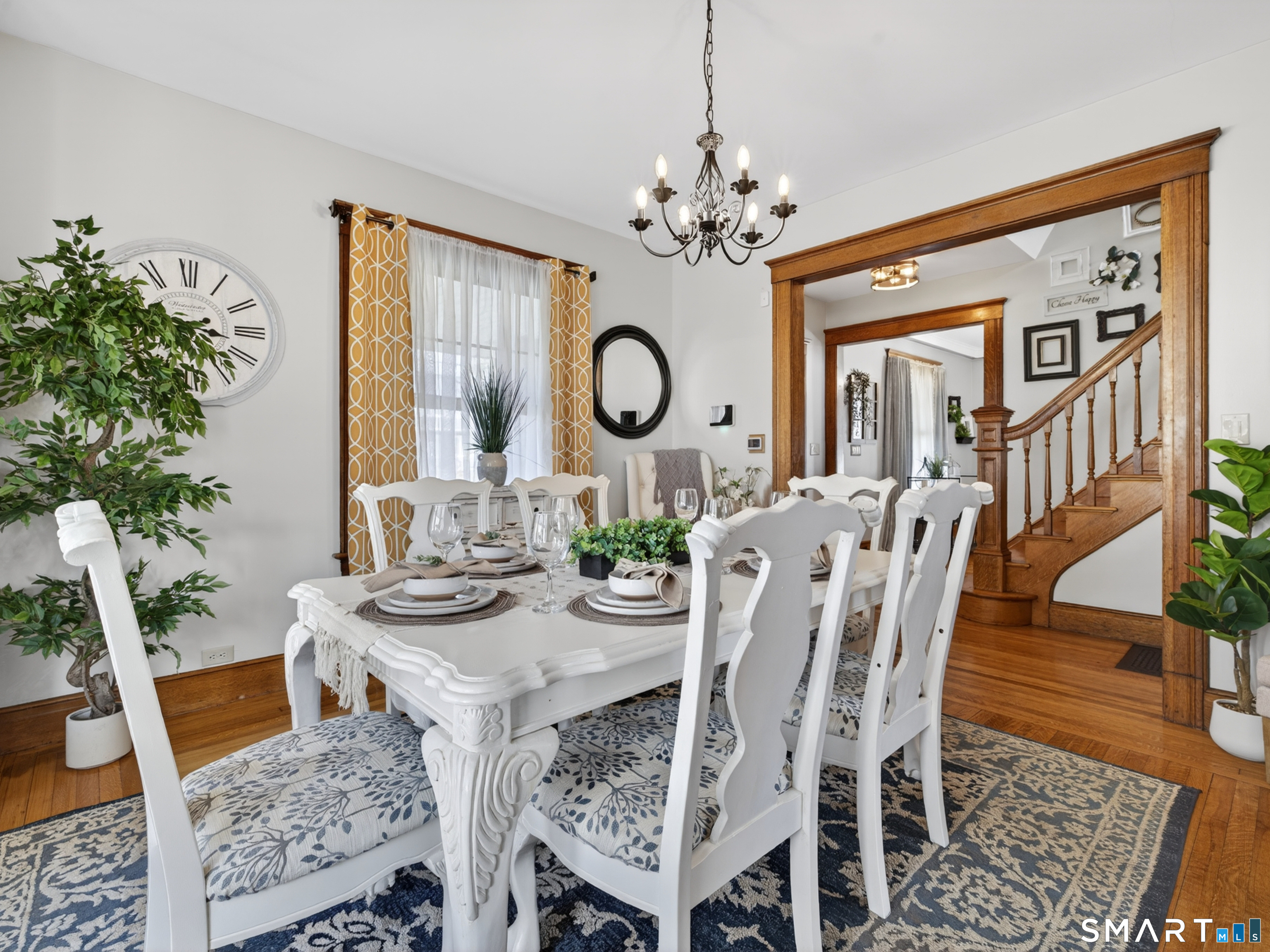 115 West Thames Street Norwich, CT 06360 - Photo 13 of 40 a view of a dining room with furniture and wooden floor