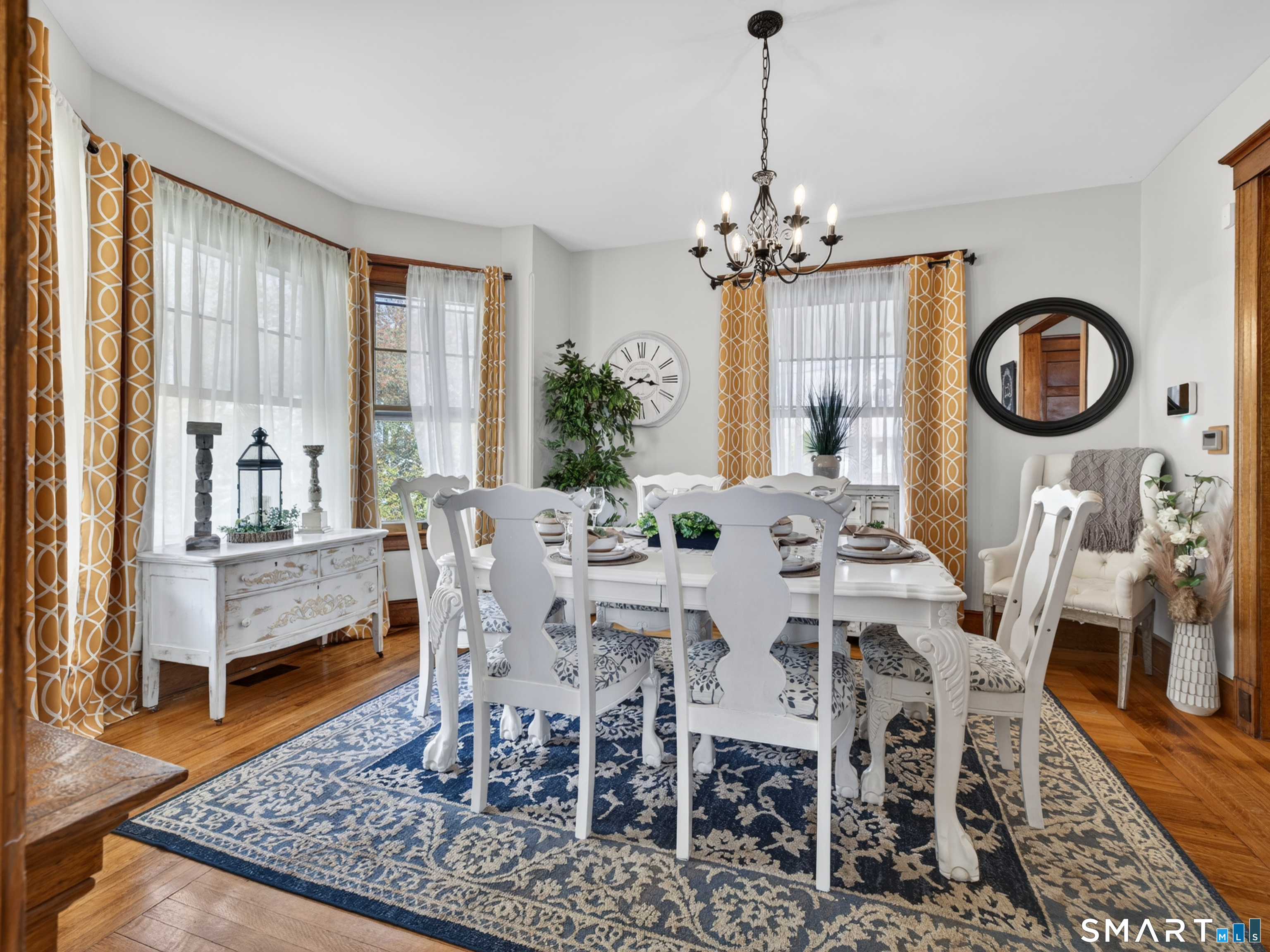 115 West Thames Street Norwich, CT 06360 - Photo 14 of 40 a view of a dining room with furniture window and wooden floor