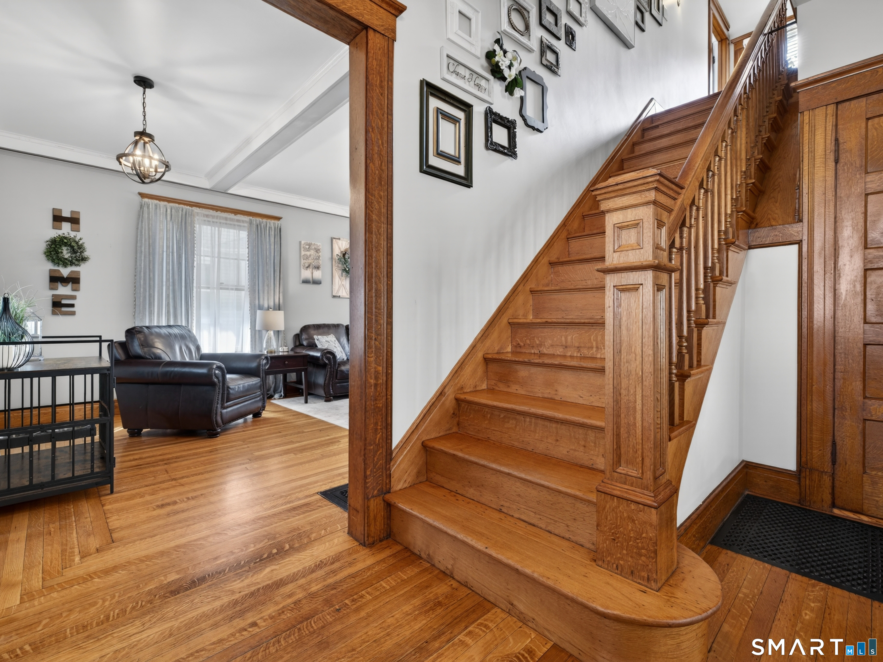 115 West Thames Street Norwich, CT 06360 - Photo 20 of 40 a view of entryway and hall with wooden floor