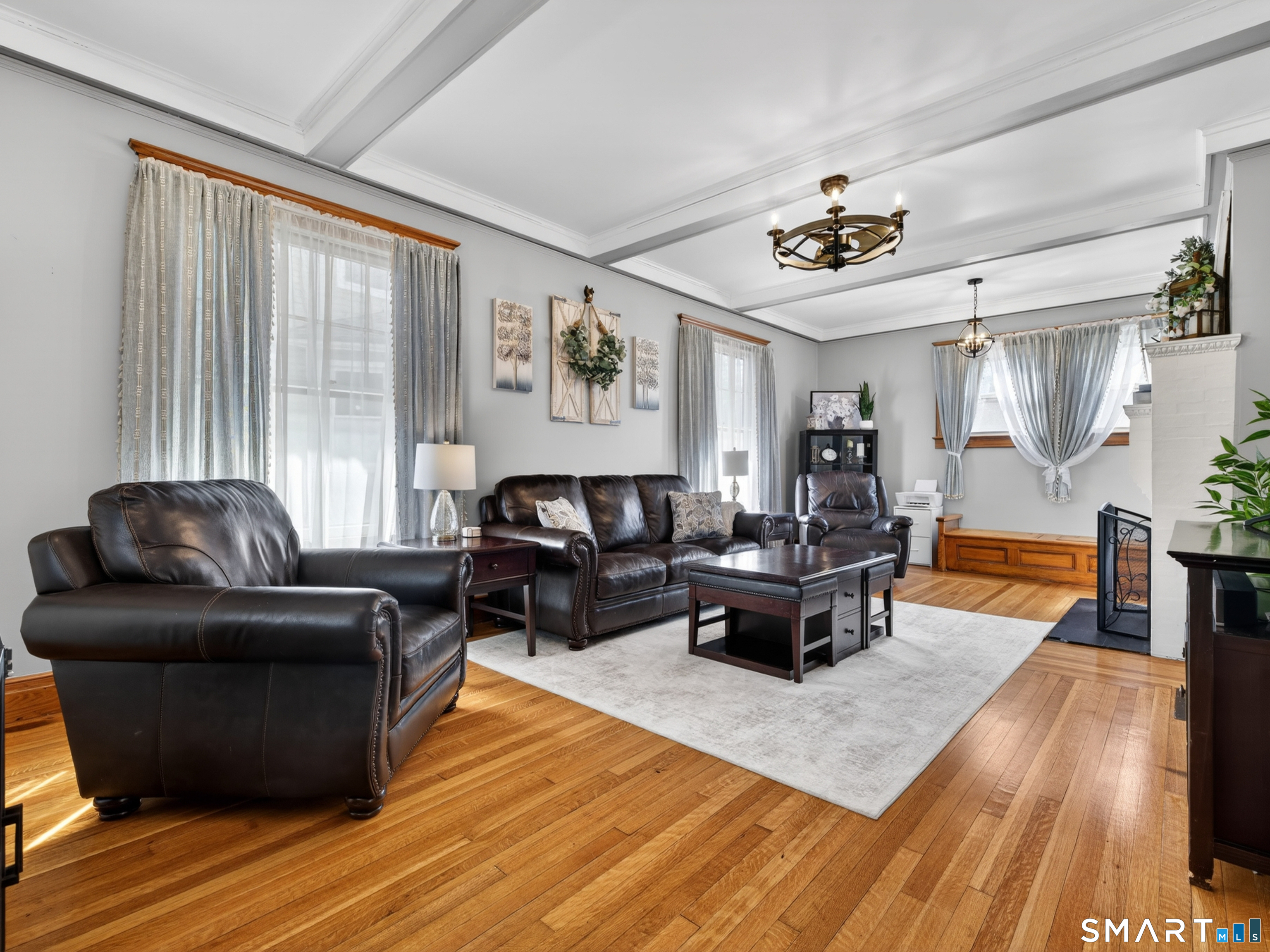 115 West Thames Street Norwich, CT 06360 - Photo 21 of 40 a living room with furniture and wooden floor