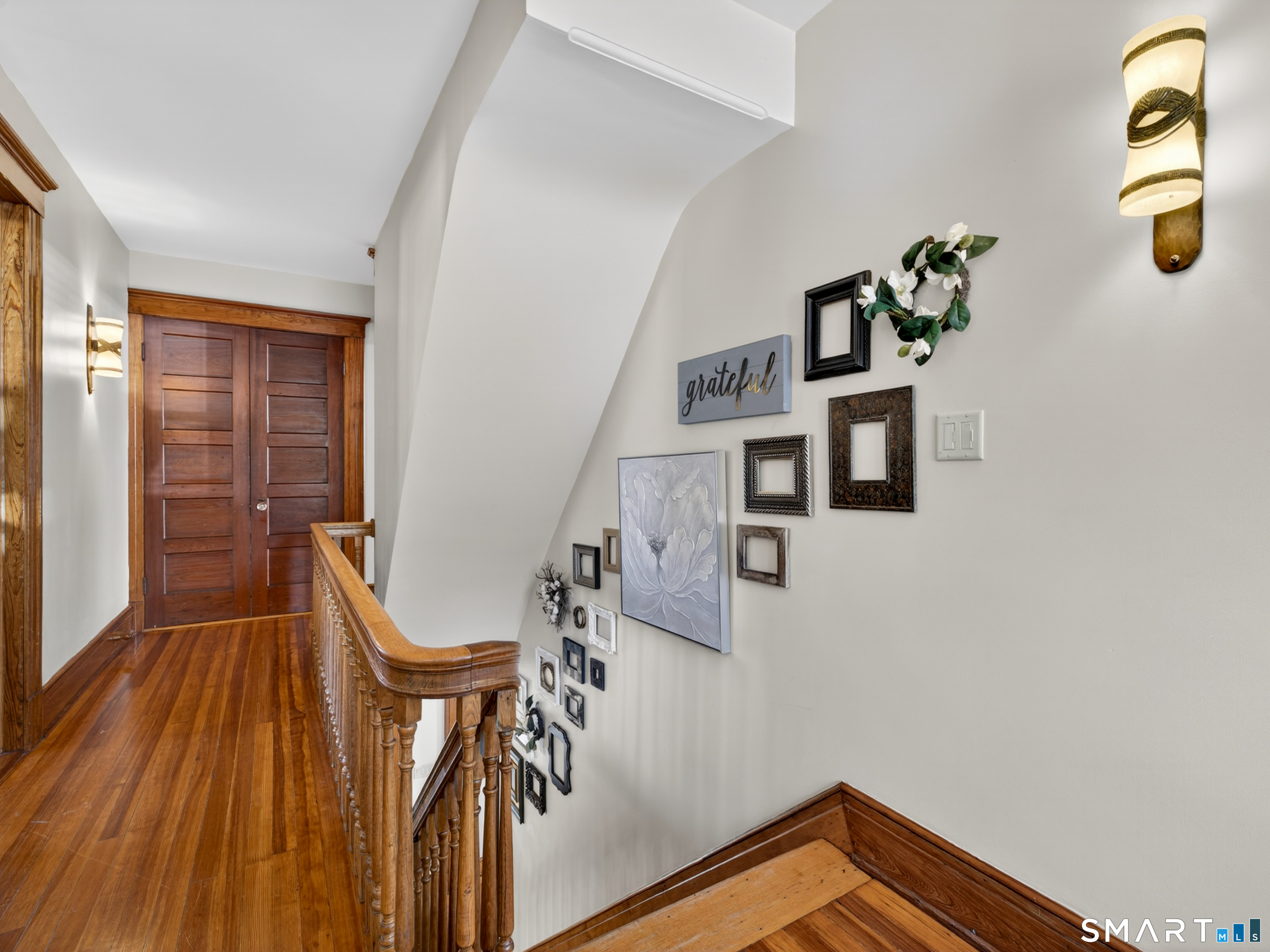 115 West Thames Street Norwich, CT 06360 - Photo 26 of 40 a view of entryway with wooden floor