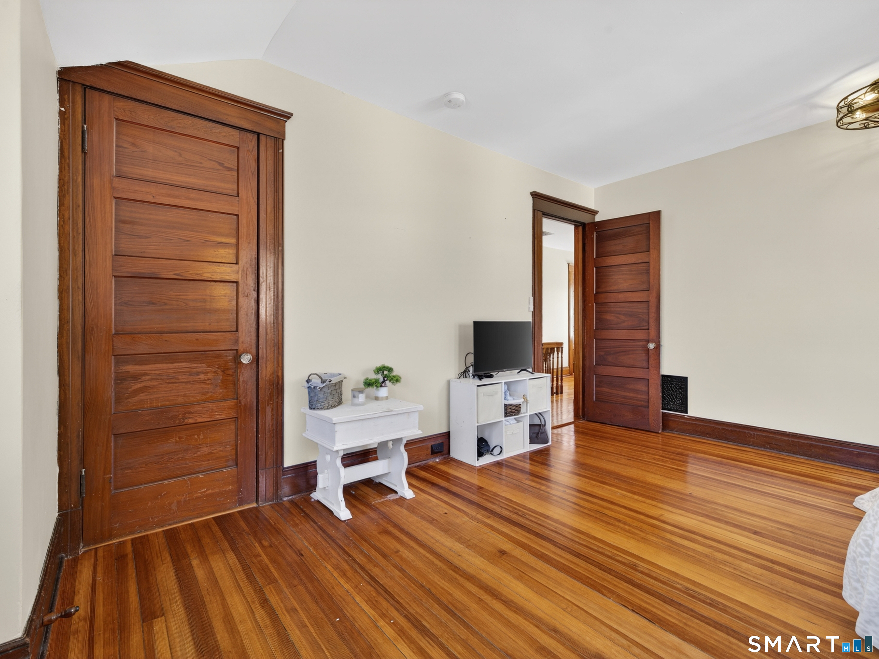 115 West Thames Street Norwich, CT 06360 - Photo 32 of 40 a view of a livingroom with furniture and wooden floor