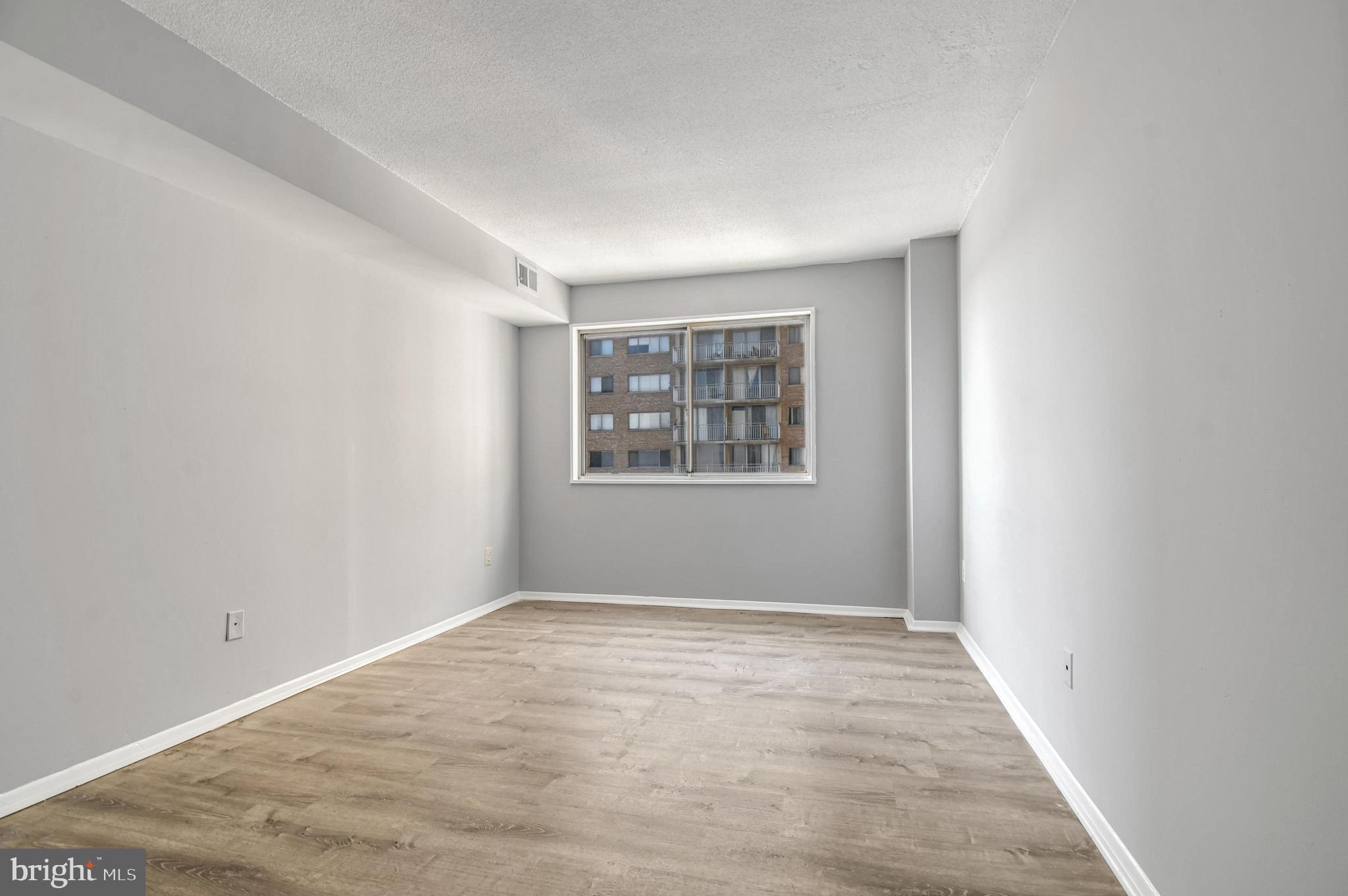 1836 Metzerott Road, Unit 925 Hyattsville, MD 20783 - Photo 12 of 33 an empty room with windows