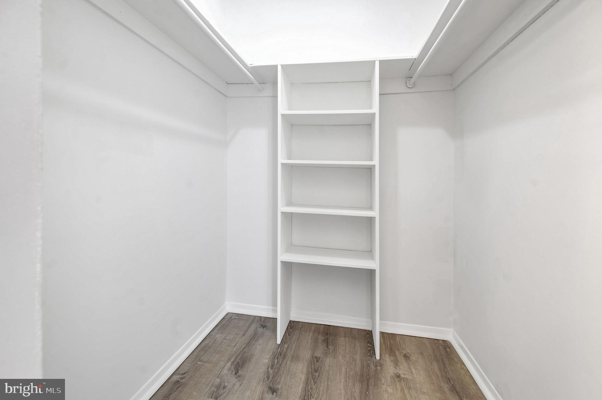 1836 Metzerott Road, Unit 925 Hyattsville, MD 20783 - Photo 20 of 33 a view of walk in closet with empty racks
