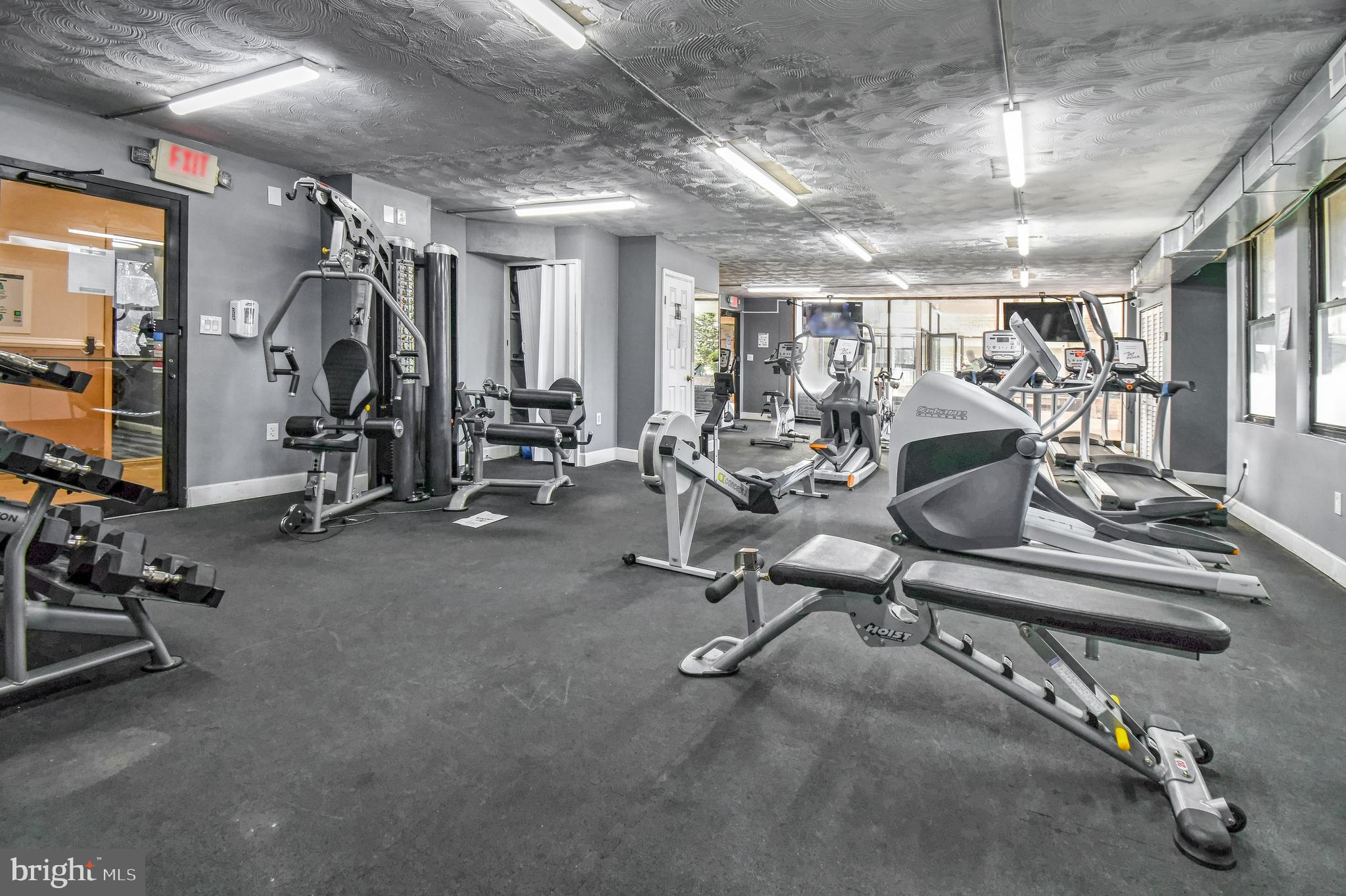 1836 Metzerott Road, Unit 925 Hyattsville, MD 20783 - Photo 28 of 33 a view of a room with gym equipment