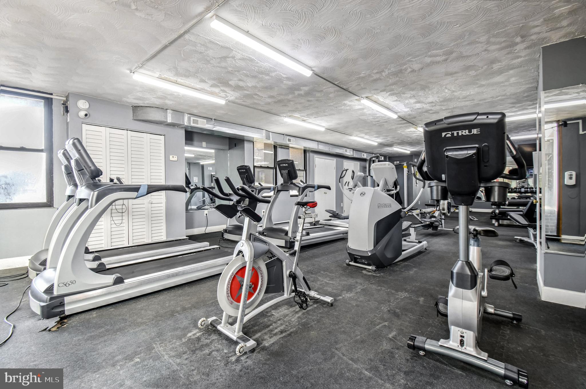 1836 Metzerott Road, Unit 925 Hyattsville, MD 20783 - Photo 29 of 33 a view of a room with gym equipment