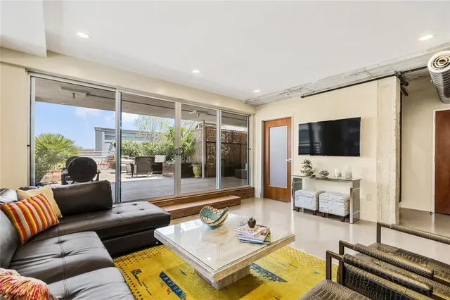 a large kitchen with stainless steel appliances granite countertop a stove and a sink