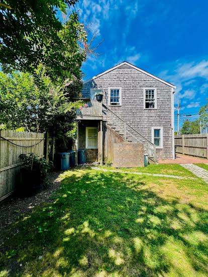 48 West Tisbury Road Edgartown, MA 02539 - Photo 2 of 8 a front view of a house with a yard
