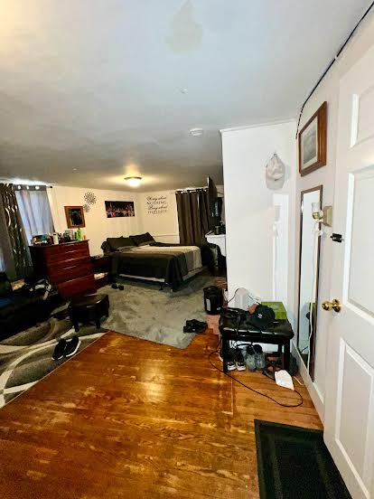 48 West Tisbury Road Edgartown, MA 02539 - Photo 6 of 8 a living room with furniture window and a wooden floor