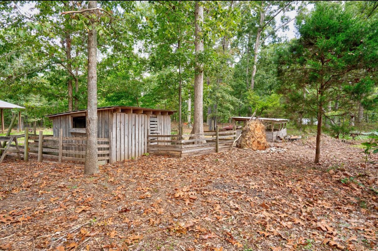 2026 Rehobeth Church Road Shelby, NC 28150 - Photo 12 of 48 a backyard of a house with lots of green space