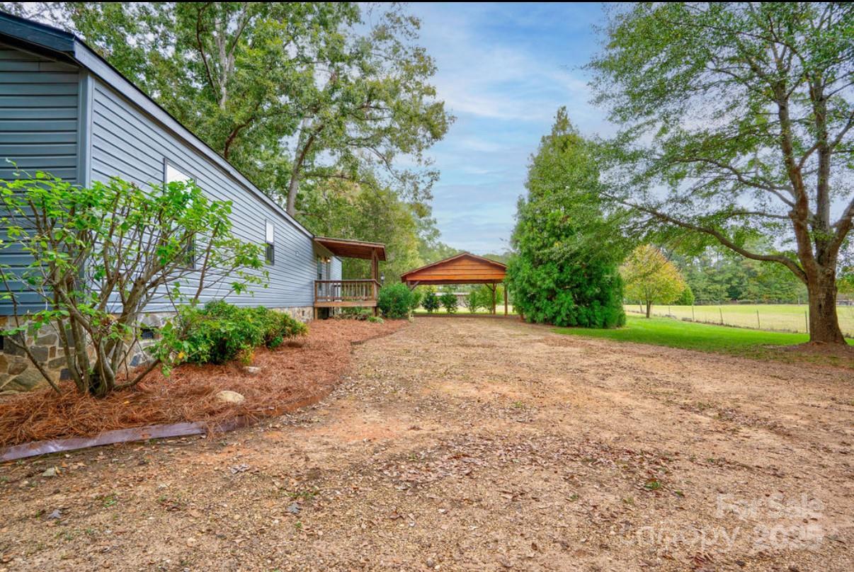 2026 Rehobeth Church Road Shelby, NC 28150 - Photo 18 of 48 a house with yard in front of it