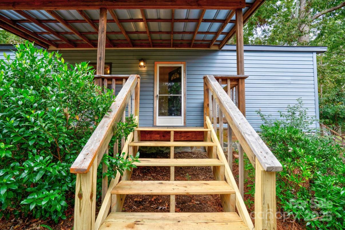 2026 Rehobeth Church Road Shelby, NC 28150 - Photo 20 of 48 a view of balcony with wooden floor and fence