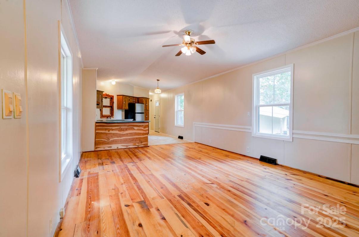 2026 Rehobeth Church Road Shelby, NC 28150 - Photo 22 of 48 a view of an empty room with wooden floor and a window