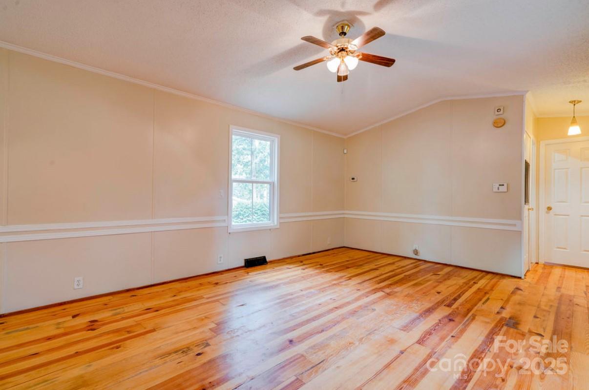 2026 Rehobeth Church Road Shelby, NC 28150 - Photo 23 of 48 wooden floor in an empty room with a window