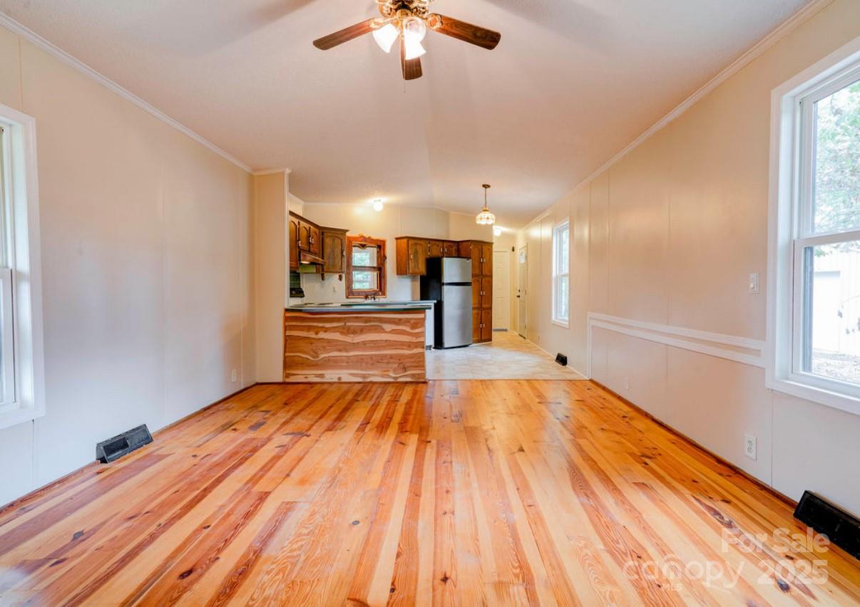 2026 Rehobeth Church Road Shelby, NC 28150 - Photo 25 of 48 a view of an empty room with wooden floor and a window