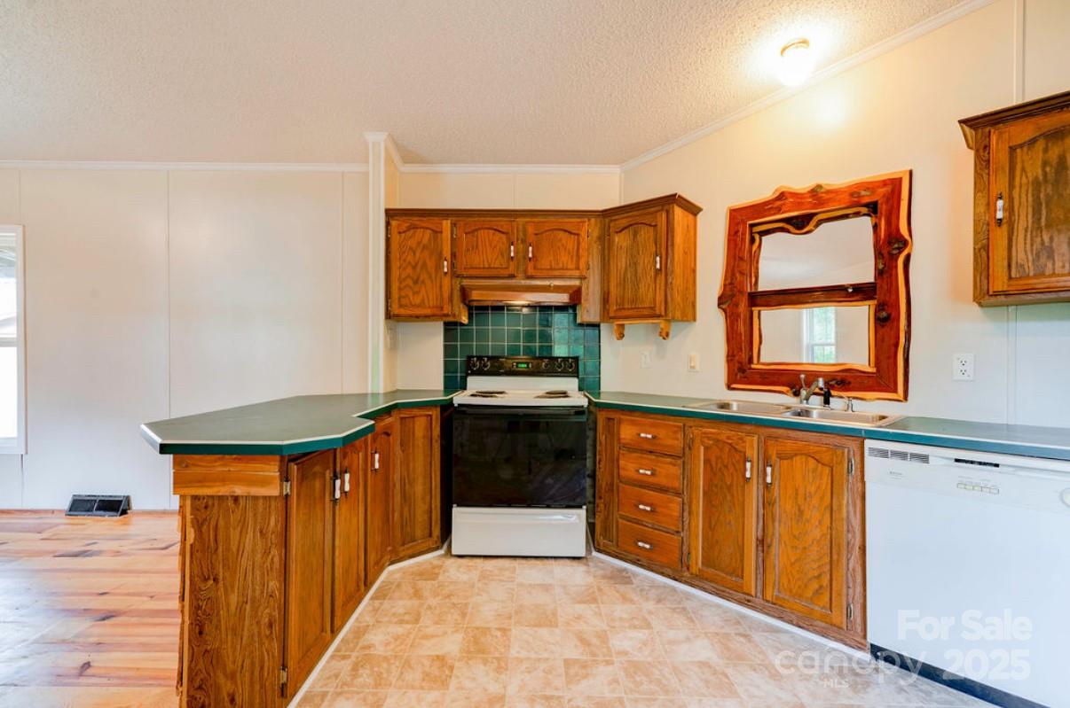 2026 Rehobeth Church Road Shelby, NC 28150 - Photo 27 of 48 a spacious bathroom with a tub sink and mirror