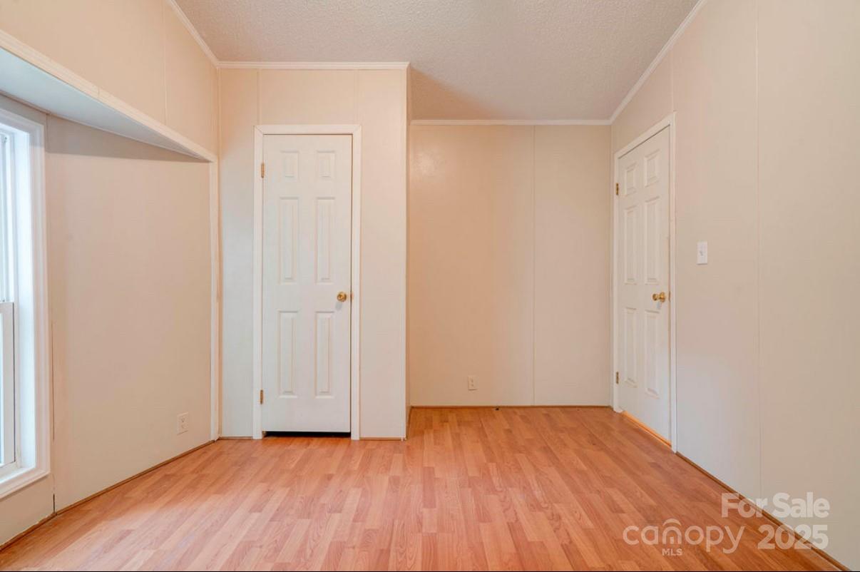 2026 Rehobeth Church Road Shelby, NC 28150 - Photo 40 of 48 a view of an empty room with wooden floor