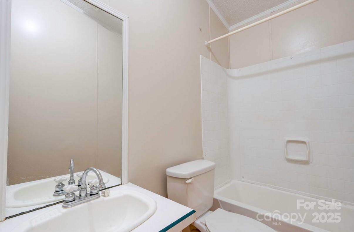 2026 Rehobeth Church Road Shelby, NC 28150 - Photo 42 of 48 a bathroom with a sink and a toilet