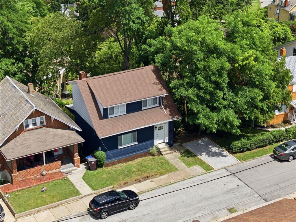 2961 Ruthwood Avenue Pittsburgh, PA 15227 - Photo 27 of 29 a aerial view of a house with a garden and parking space
