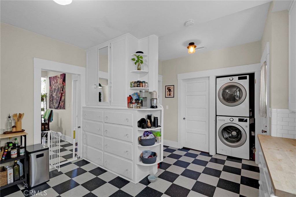 3744 Stoddard Avenue Riverside, CA 92501 - Photo 11 of 29 a view of a refrigerator and washer in a bedroom
