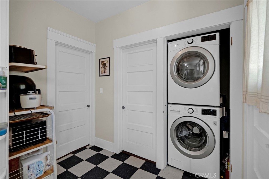 3744 Stoddard Avenue Riverside, CA 92501 - Photo 13 of 29 a view of a storage and utility room with washer and dryer